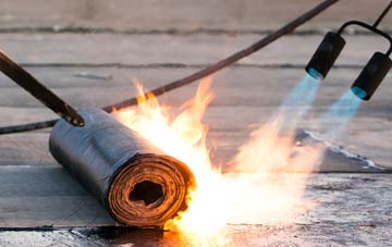 Crew Upper asphalt flat roofing repairs