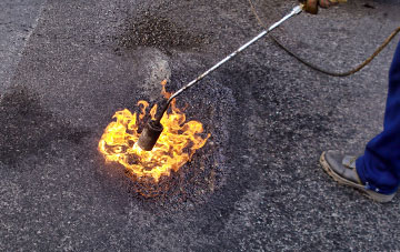 Crew Upper flat roofing repairs